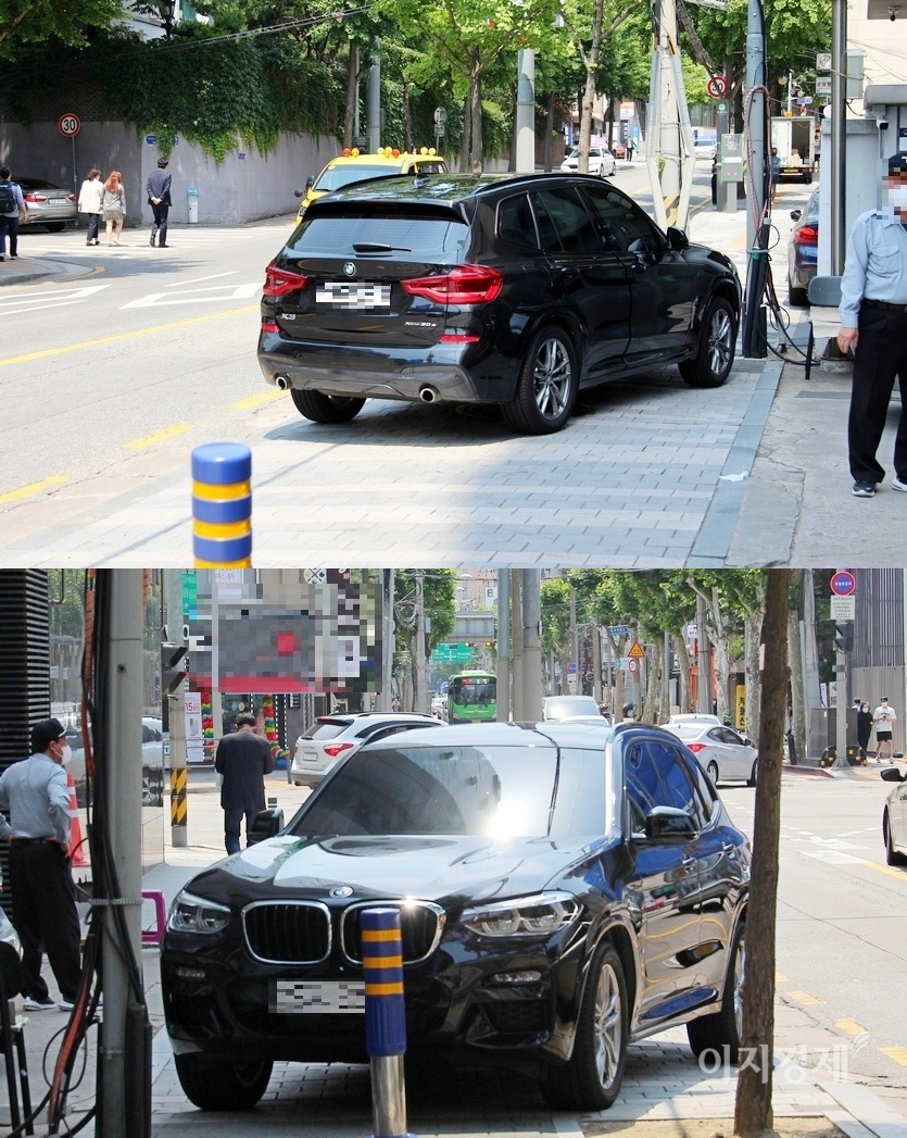 BMW 코리아 방배전시장 직원이 차량을 인도 중앙에 주차하고 사라졌다. 사진= 정수남 기자