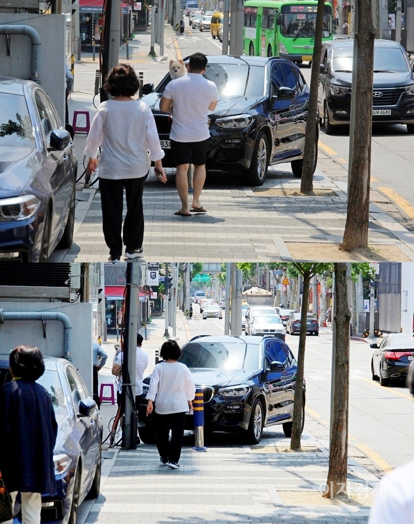 서래마을에서 함지박사거리로 향하는 주민들이 어렵게 차량을 피해 가고 있다. 사진= 정수남 기자