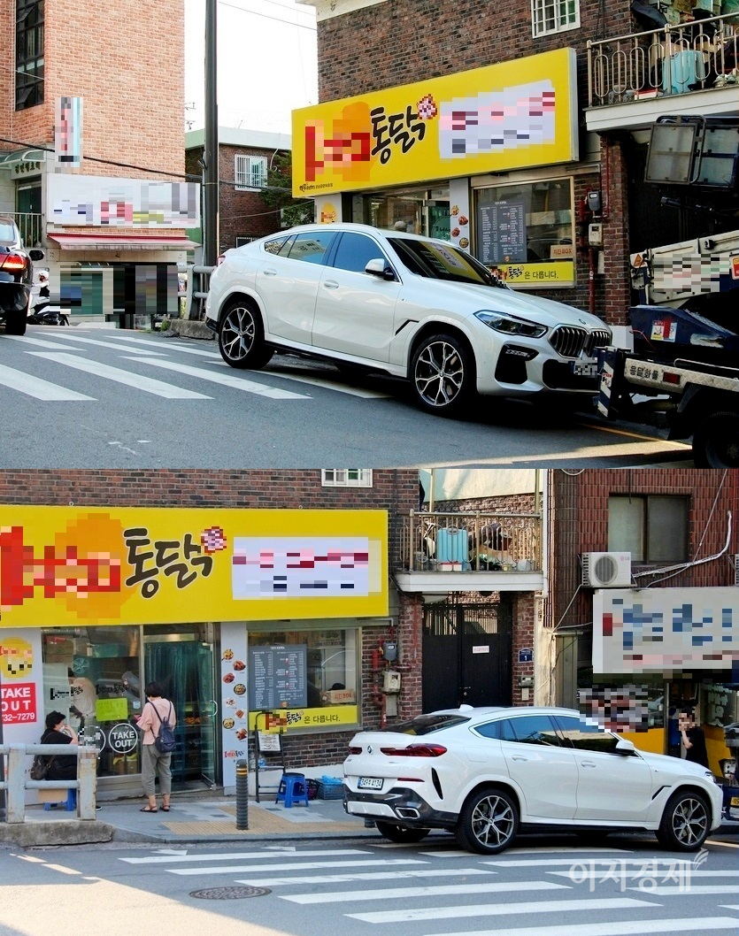 상기 상황이 발생한지 3일이 지난 지난주 금요일 모습이다. X6가 횡단보도 절반을 차지해 주차해 있다. 차주는 통닭집 주인이다. 사진=정수남 기자