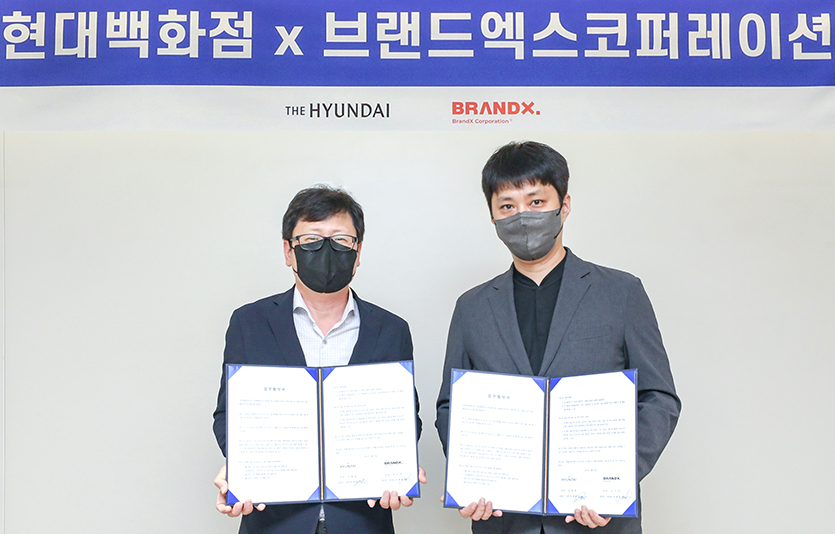 (왼쪽부터) 박채훈 현대백화점 미래사업부 사업부장과 박희종 브랜드엑스코퍼레이션 부대표. 사진=현대백화점