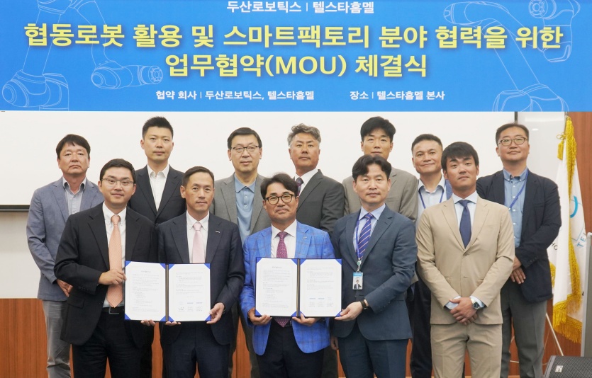 두산로보틱스-텔스타홈멜 MOU 체결식. 사진=두산로보틱스